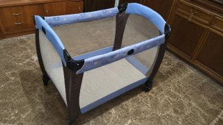 Cuna de viaje plegable tipo estuche