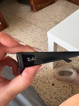 Gafas de sol Ray-Ban negras y marrones