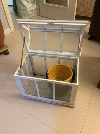Invernadero de cristal y madera