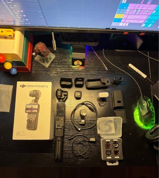 DJI Osmo Pocket 4 Creator Combo + Micro