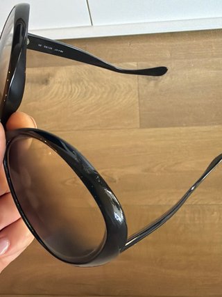 Gafas de sol Ray-Ban negras y marrones