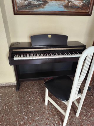 Piano Eléctrico Yamaha Clavinova.