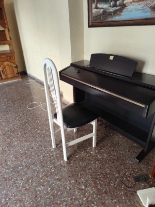 Piano Eléctrico Yamaha Clavinova.