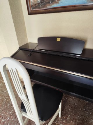 Piano Eléctrico Yamaha Clavinova.