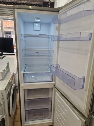 Nevera marca Beko altura 1:85 cm ancho 60cm.