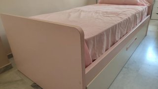 Cama nido rosa y blanca