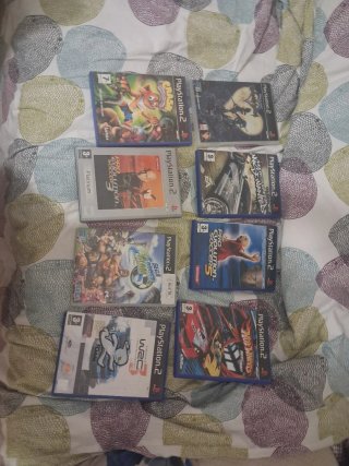Cajas de PS2 con manuales