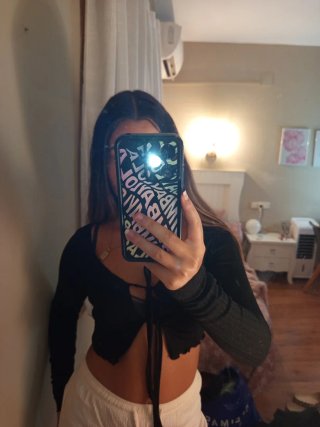 Top Bershka Negro con Purpurina