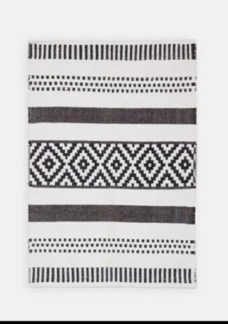 Alfombra étnica blanco y negro