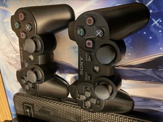 PS3 Slim 250GB + 2 mandos + 6 juegos