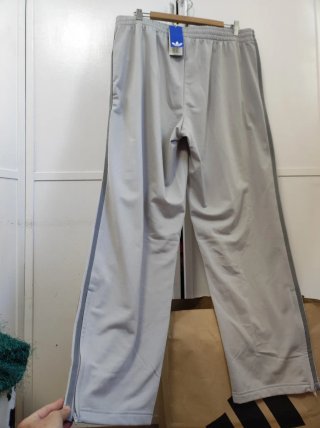 Pantalón Adidas firebird JP2538, Gris