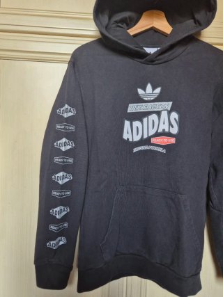 Felpa Adidas con logo Triple Action