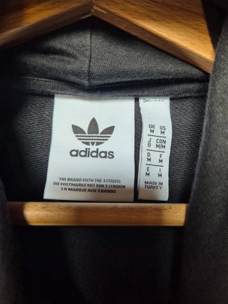 Felpa Adidas con logo Triple Action