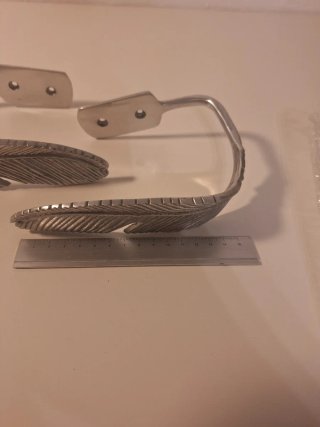 Sujetacortinas metal diseño pluma
