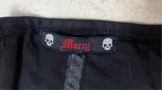 Corsé negro Merry con lazada blanca