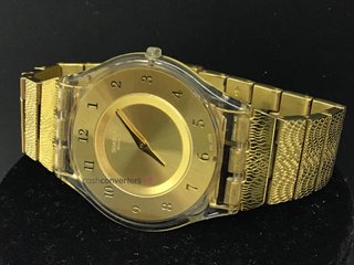 reloj pulsera señora swatch dorado