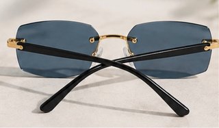 Gafas de sol sin montura azules y doradas