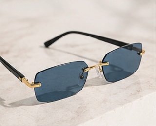 Gafas de sol sin montura azules y doradas
