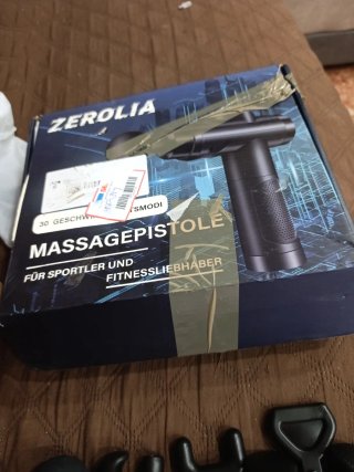 Pistola de masaje