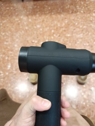 Pistola de masaje