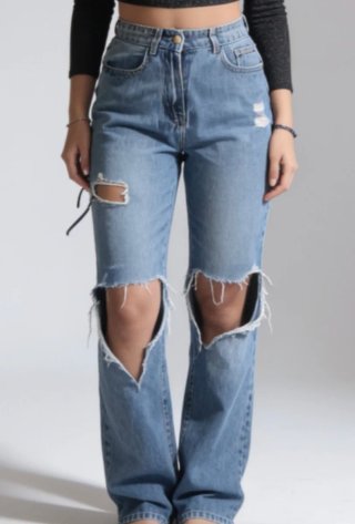 Jeans a zampa vita alta strappati