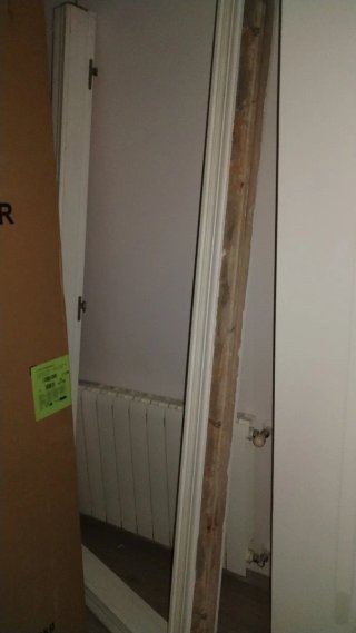 Puerta madera maciza blanca cristalera