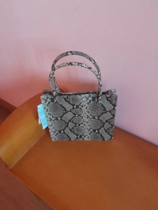 Bolso estampado serpiente Mango