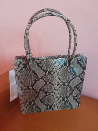 Bolso estampado serpiente Mango