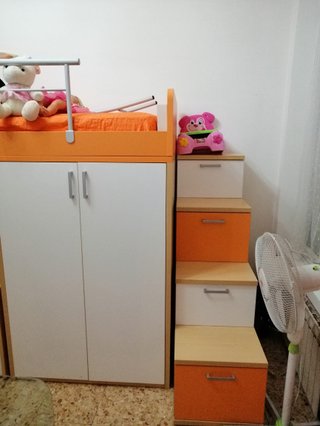 Letto a castello con armadi e cassetti