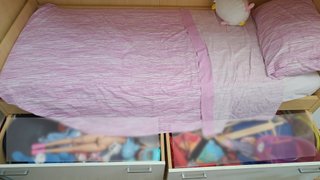 Letto a castello con armadi e cassetti
