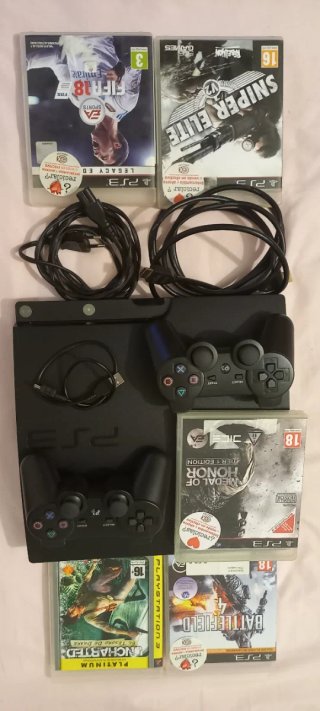 PS3 con 2 Controles y 5 Juegos