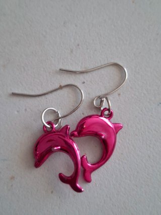 Pendientes de delfines rosa sin estrenar