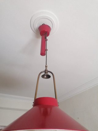 Lámpara quinqué con pesa colgante