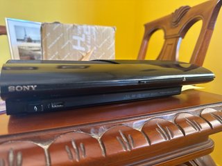 PS3 Super Slim + 2 Mandos + Volante + 7 Juegos