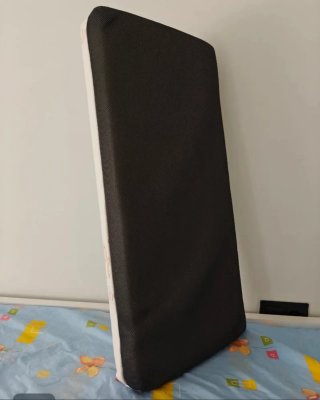 Minicuna de madera con ruedas