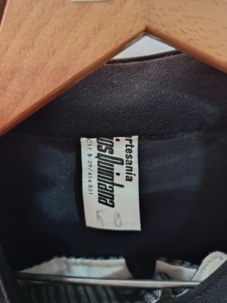 Chaquetilla traje corto.