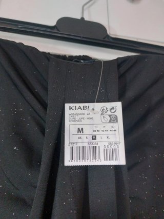 Falda larga Kiabi negra con brillos