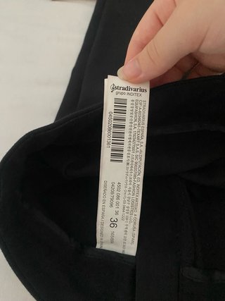 Pantalón de vestir negro con pinzas