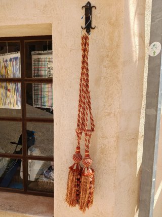 Borloni vintage per tende in tonalità terracotta/oro