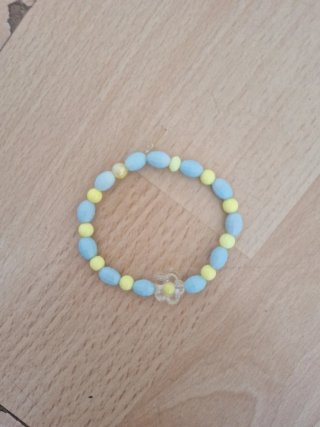Braccialetto per bambini con fiore blu e giallo