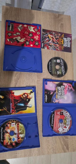 Consola PlayStation 2 Negra + Guitarra + JUEGOS