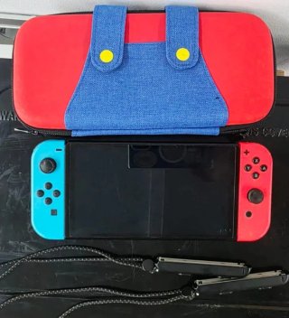 Nintendo Switch OLED Nero/Rosso e accessori