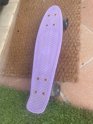 Monopatín morado