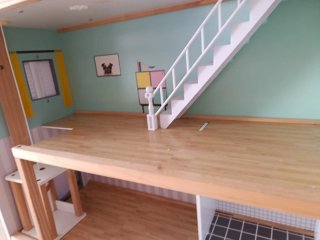 Casa de muñecas de madera