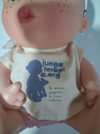 Muñeco Baby Pelón con gorrito