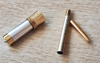 Funda pintalabios y lápiz ojos oro/plata