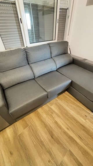 Sofá chaiselongue gris tela