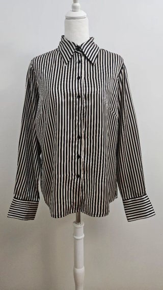 Blusa de rayas beige y negro talla 46