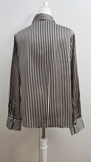 Blusa de rayas beige y negro talla 46