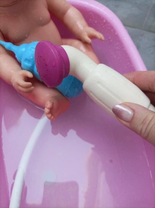 Muñeco bebé con bañera y accesorios